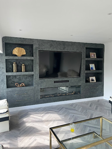 Charcoal Venetian plaster media wall installation